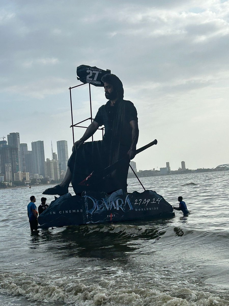 CinemaEnts's tweet photo. #Devara cutout is standing tall in the sea  in Mumbai
#DevaraOnSep27th #jrntr #ntr #manofmassesntr #fearsong #koratalasiva #devaraonsep27th #devarafirstsingle #ntrneel #devara #allhailthetiger #ntr30 #war2 #ntr31 #janhvikapoor #anirudhravichander #anirudhbgm #anirudh #ntrupdates https://t.co/LfEybBuTwl