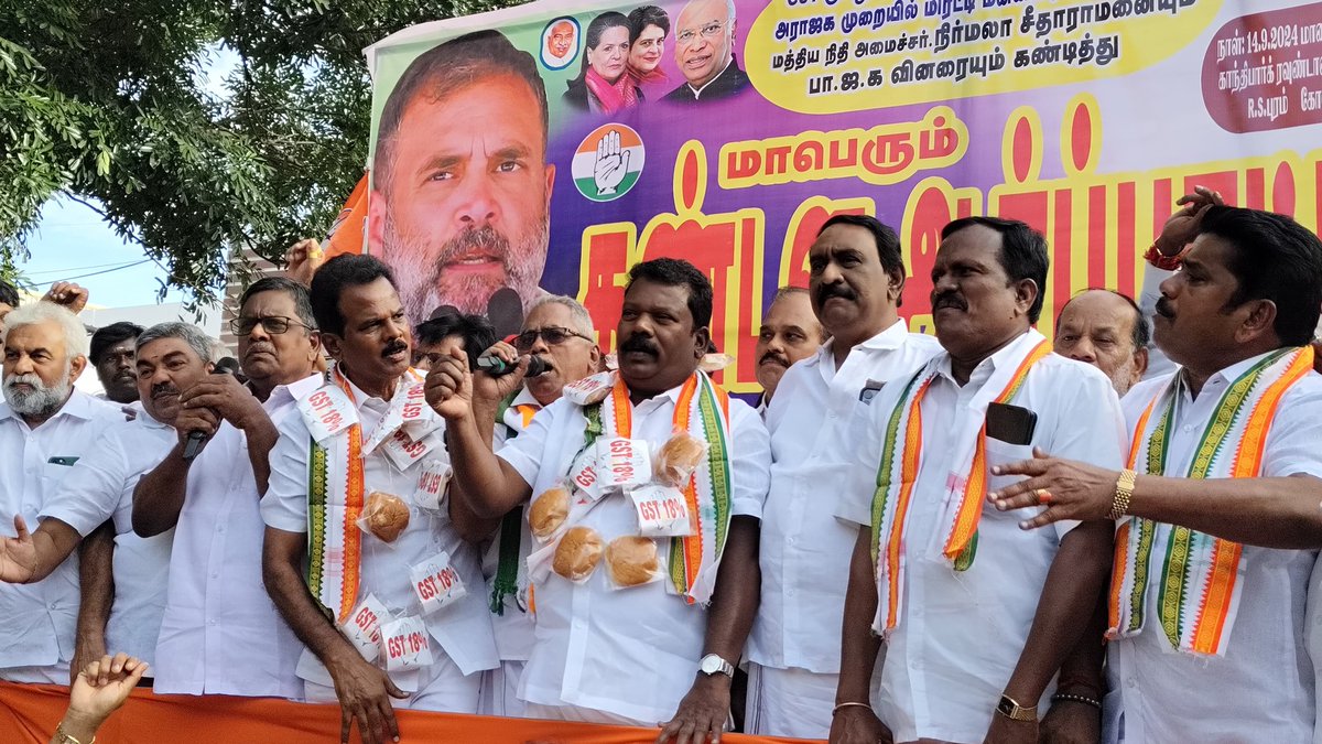 மத்திய நிதி அமைச்சரையும் பாஜகவையும் கண்டித்து கோவையில் ' பன் மாலை' அணிந்து தமிழ்நாடு காங்கிரஸ் தலைவர் செல்வப் பெருந்தகை தலைமையில் ஆர்ப்பாட்டம் #AnnapoornaSrinivasan #GST #Coimbatore #Congress #BJP #NirmalaSitharaman #CreamBun