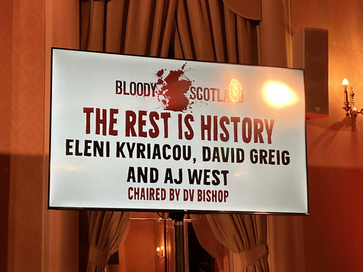 elenikwriter's tweet photo. Loved taking part in @BloodyScotland - thank you to @davidbishop for his expert hosting skills (and amazing footwear), and #DavidGreig and @AJWestAuthor for making it such fun. And, of course, everyone who came, asked questions and bought books. Readers are the BEST https://t.co/mplYIINnWl