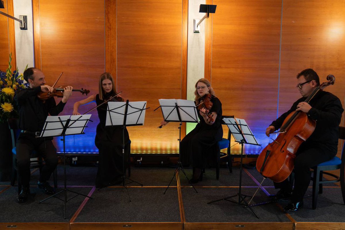 KyivSymphony's tweet photo. Our string quartet performed at the @UKRinDEU for Ukraine’s Independence Day, marking the partnership between Mecklenburg-Vorpommern Bundesland and Chernihiv region with the participation of @Makeiev &amp; @ManuelaSchwesig

Lyatoshynsky’s “Suite on Ukrainian Themes” sounded 🇺🇦 https://t.co/yQLxBdJ4J2