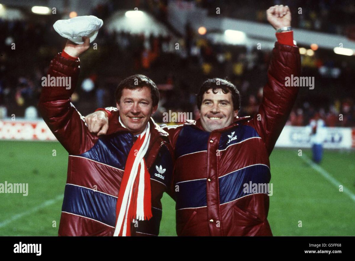 jakodesigns's tweet photo. Aberdeen FC - Adidas - third

based on the tracksuits worn in this image of Alex Ferguson and his assistant after @AberdeenFC won the 1983 Cup Winners Cup

not sure where it would be used as the club play in red, maybe as a third kit? https://t.co/thhqxDGycx