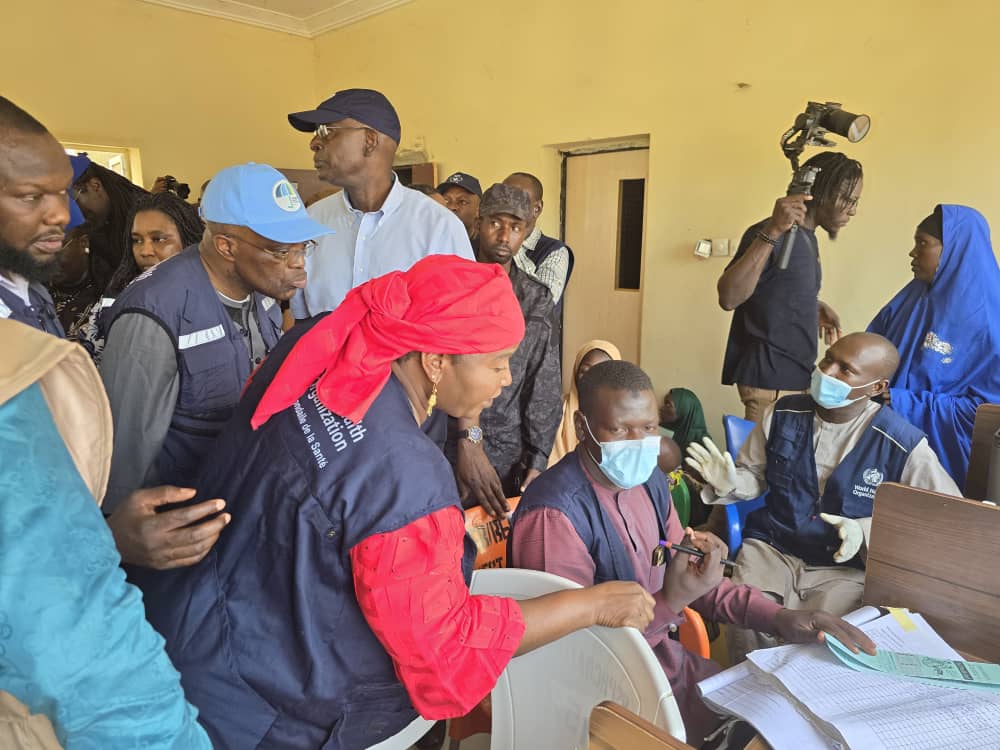 WHONigeria's tweet photo. The @UN_Nigeria team and Members of the diplomatic Community led by @MohamedFall UNRC/HC had first hand assessment of damaged caused by the #Maiduguriflood and ensuing humanitarian crisis, compounding the nutrition and health crisis faced by people of Borno https://t.co/Voy8B7spQO
