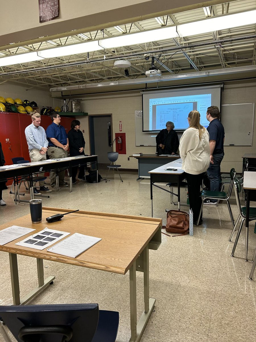 KHSAcademics's tweet photo. This week our EMT students participated in a Mock Trial about a faulty AED. Guest “attorneys” Hansel &amp; Tiebout helped out and “Judge Carney” presided. The big takeaway? Proper documentation of rig checks each shift is important! Great job students! https://t.co/TAdwQIg2gT