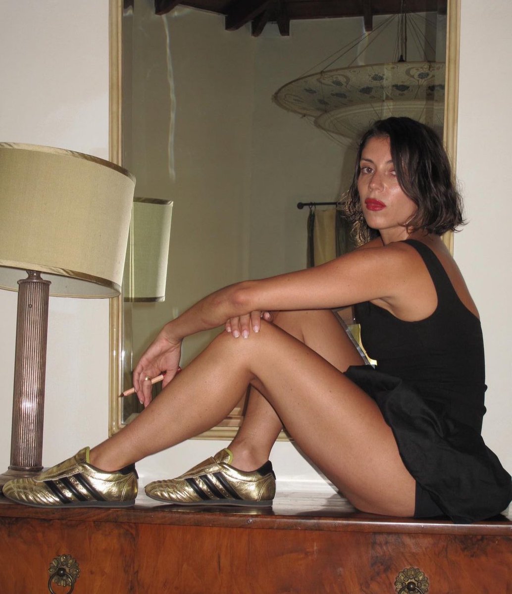 TheSnobette's tweet photo. Alexia Elkaim, founder of womenswear label Miaou, has teamed up with Adidas Originals to release a limited edition pair of Gold Taekwondo sneakers.
The colorway draw inspiration from France's soccer legend Zinedine Zidane and his iconic golden Predator Absolute cleats, worn during his farewell game at the2006 FIFA World Cup.Drop deets:https://t.co/bpjtatHKCB