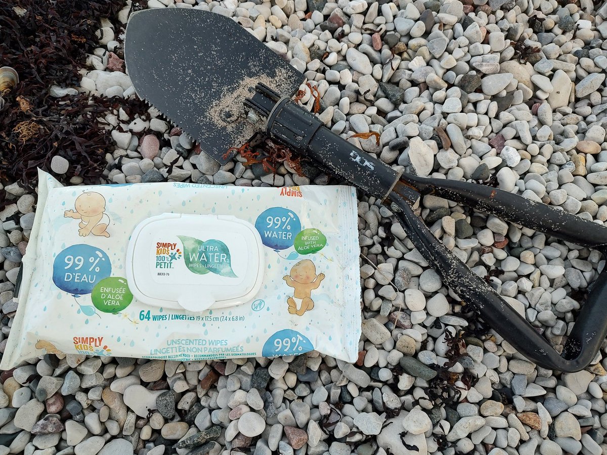 Requisite gear for going to take care of business on the Northwest Passage shore stop.