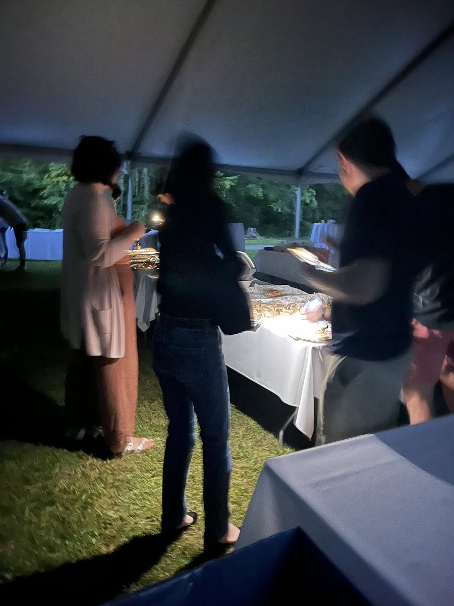 Grad students in their natural habitat (the leftovers table in the dark)