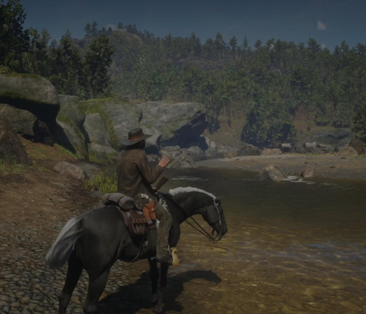 Even deadly outlaws have to pause to enjoy a smoke and some scenery.

#RedDeadRedemption2 #reddeadonline