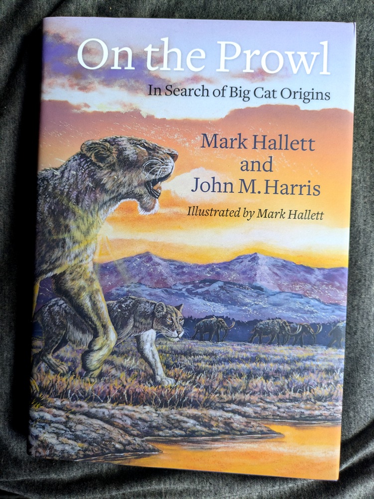 rebecca_lexa's tweet photo. So excited to finally meet paleoartist Mark Hallett at the @OMSI Science Festival! Been a fan of his since my '80s #Zoobooks years, got a signed copy of his '20 book on #bigcat evolution, full of his gorgeous #paleoart. #Felidae #prehistory #prehistoric #wildlife https://t.co/0QlNoPFVJo