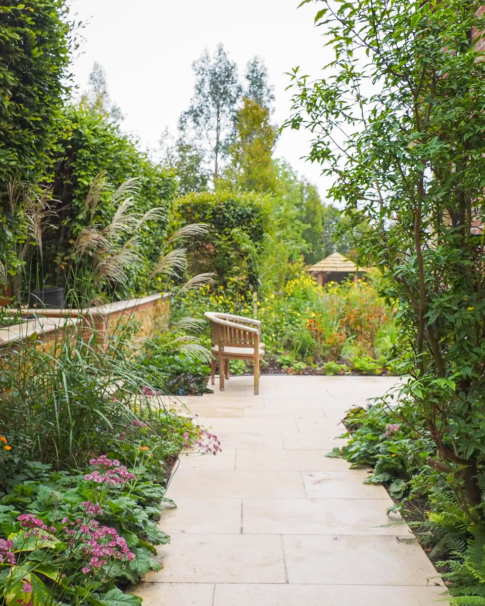 AnnMariePowell's tweet photo. Day 15 of #Summerscapes: We designed this garden path to seamlessly transition from front to rear garden, making it irresistibly inviting. It beckons you to explore, revealing concealed views and the wider garden beyond. What makes a garden path irresistible to YOU? Let us know! https://t.co/dJVzl409nC