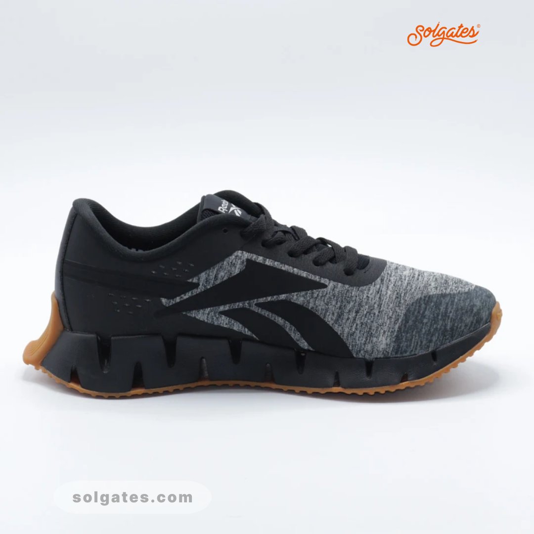 SolgatesKenya's tweet photo. The Reebok Zig Dynamica 2 is a performance-driven sneaker designed for both style and comfort.The signature zigzag sole enhances energy return, providing a cushioned and responsive ride. Get your pair to get that extra bounce and style you need for every step.  
#solgates https://t.co/nvOb1inrHE