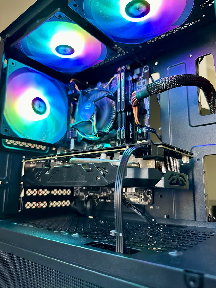 Super clean build. In this latest project, we're pairing an Intel 4th gen i7 with an AMD RX 590. Stress testing has shown it to be a rock solid 1080p gaming machine achieving 60 FPS on medium to high settings in games like Counterstrike 2 and Wukong.