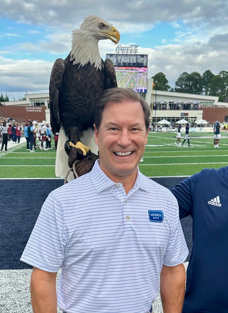 It’s Official! Morris Bank’s new Chief Banking Officer, John Hall, celebrated his first Georgia Southern football game in style, receiving a special welcome from Freedom, the Eagles live mascot. 🦅  #GATA