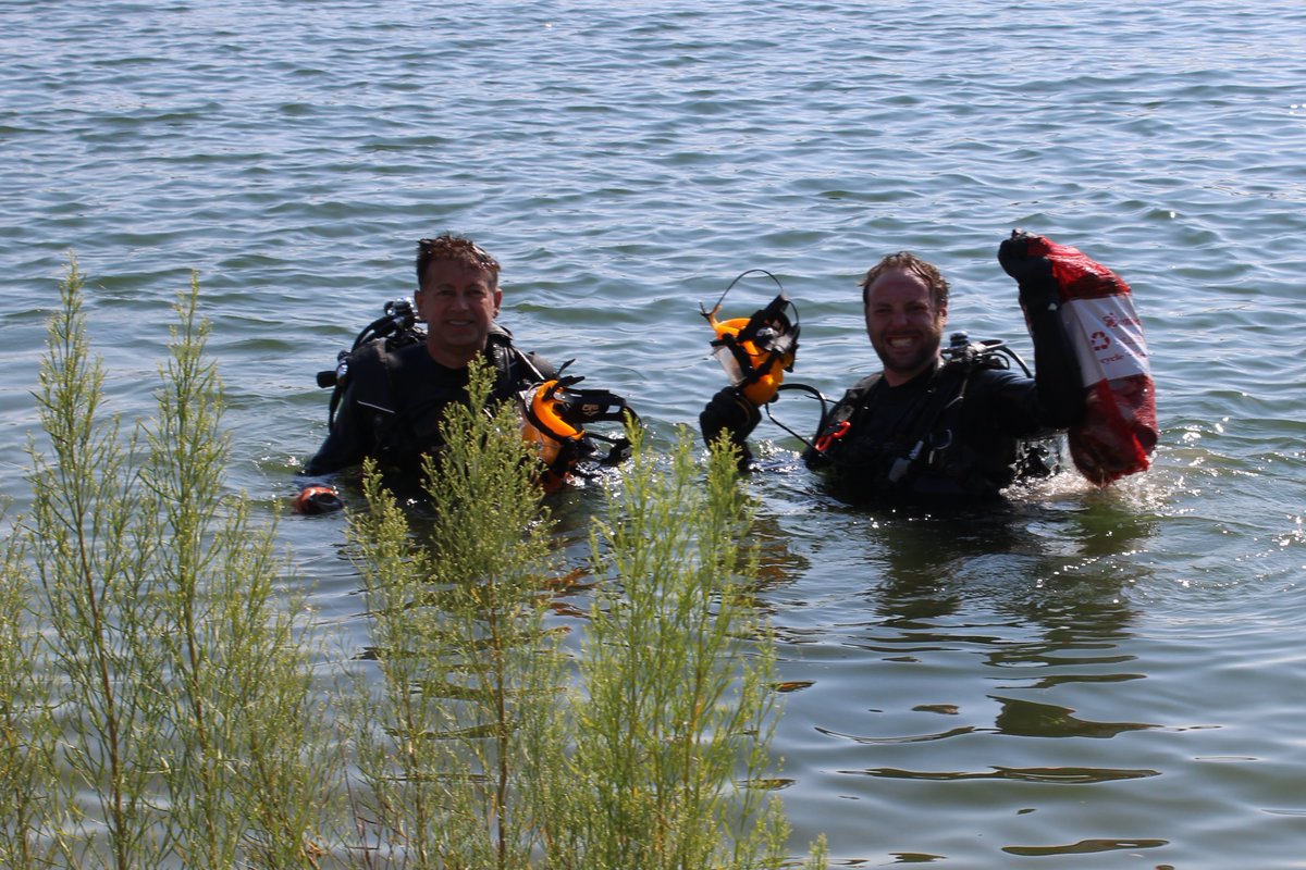 TravisCoSheriff's tweet photo. It's always a great time participating in the annual #LakeTravisCleanup! Thank you to the TCSO Dive Team and all of this year's volunteers in helping us to keep Lake Travis beautiful. https://t.co/7AhxfVXzgF