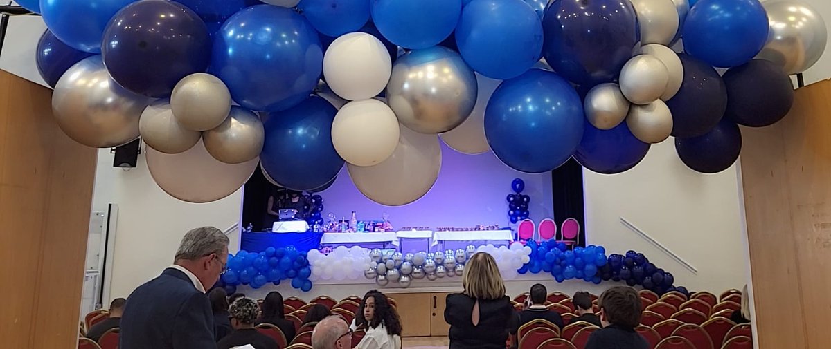 CulinaryCCLtd's tweet photo. Junior Elite Football Club's Annual Award Ceremony 
I was honoured again another year with decorating for this amazing event.
Thank you for another year and well done
Navy Blue, Royal Blue, Silver and White with stage lining, entrance strip arch and columns &amp; table decorations. https://t.co/PfNhNuz3JL