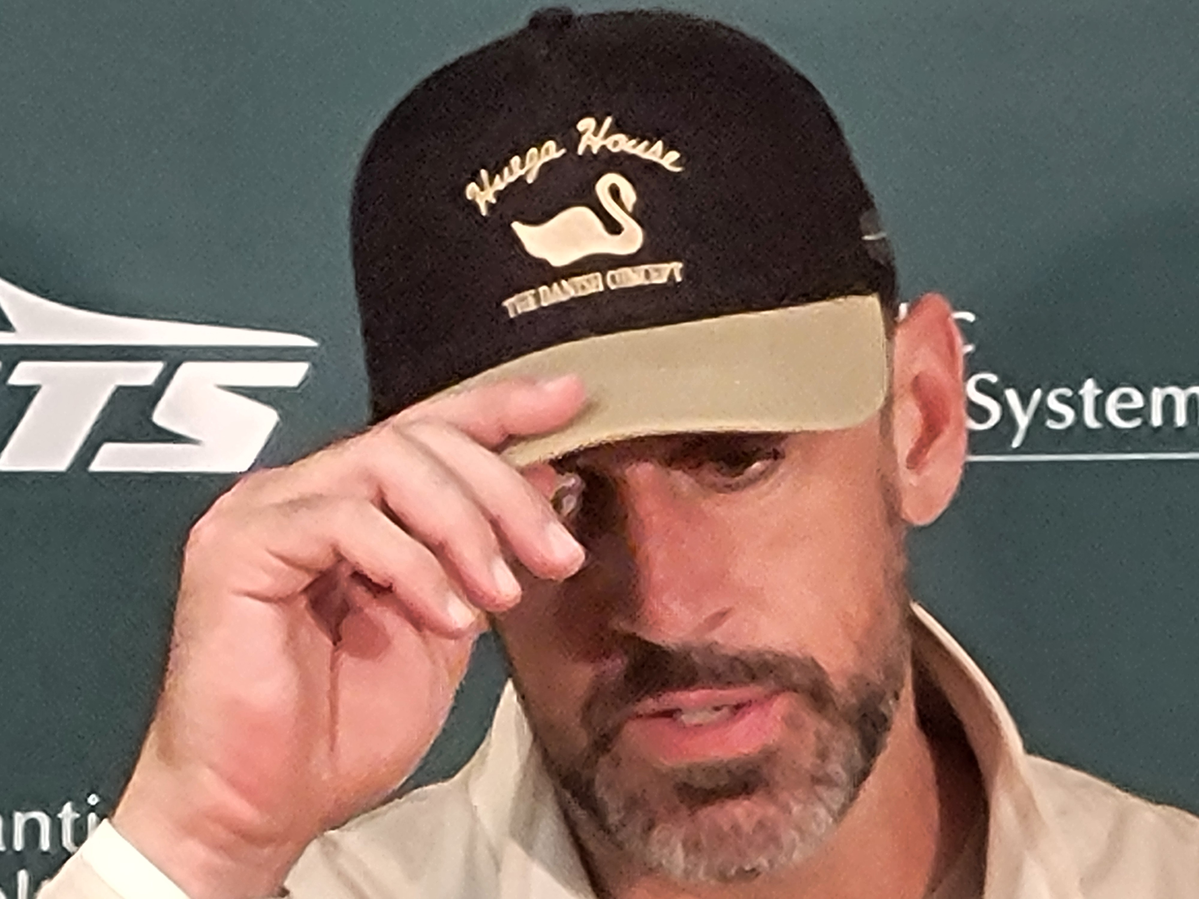 Dan Leberfeld on X Aaron Rodgers sporting one of his favorite hats after the game. The Huega House mantra is finding joy by cherishing life s little moments and Rodgers was certainly doing