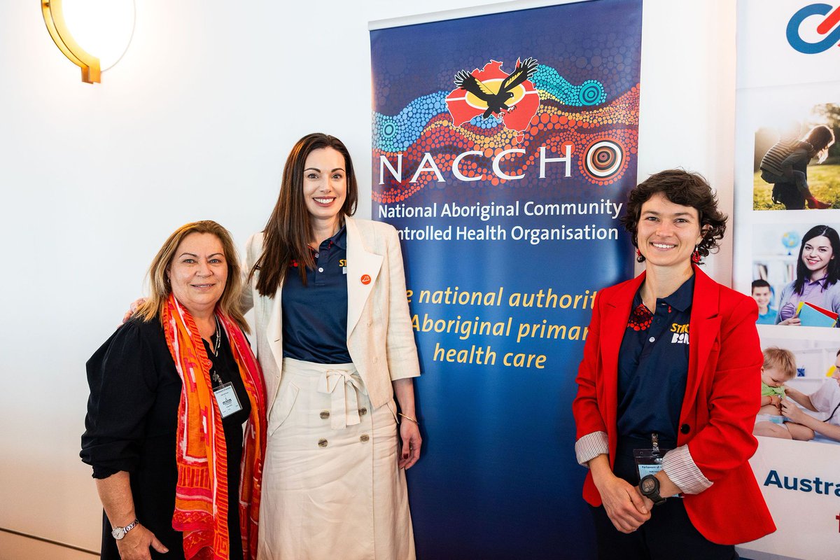NACCHOAustralia's tweet photo. The NACCHO Maternal and Child Health (FASD) team at Parliament House on FASD Awareness Day, joined by Dr Robyn Williams, Nyoongar woman and Senior Research Fellow specialising in FASD. 

#RedShoesRock #FASDAwarenessMonth #StrongBorn @FAREAustralia @NOFASDAustralia https://t.co/cy6M0PvIB4