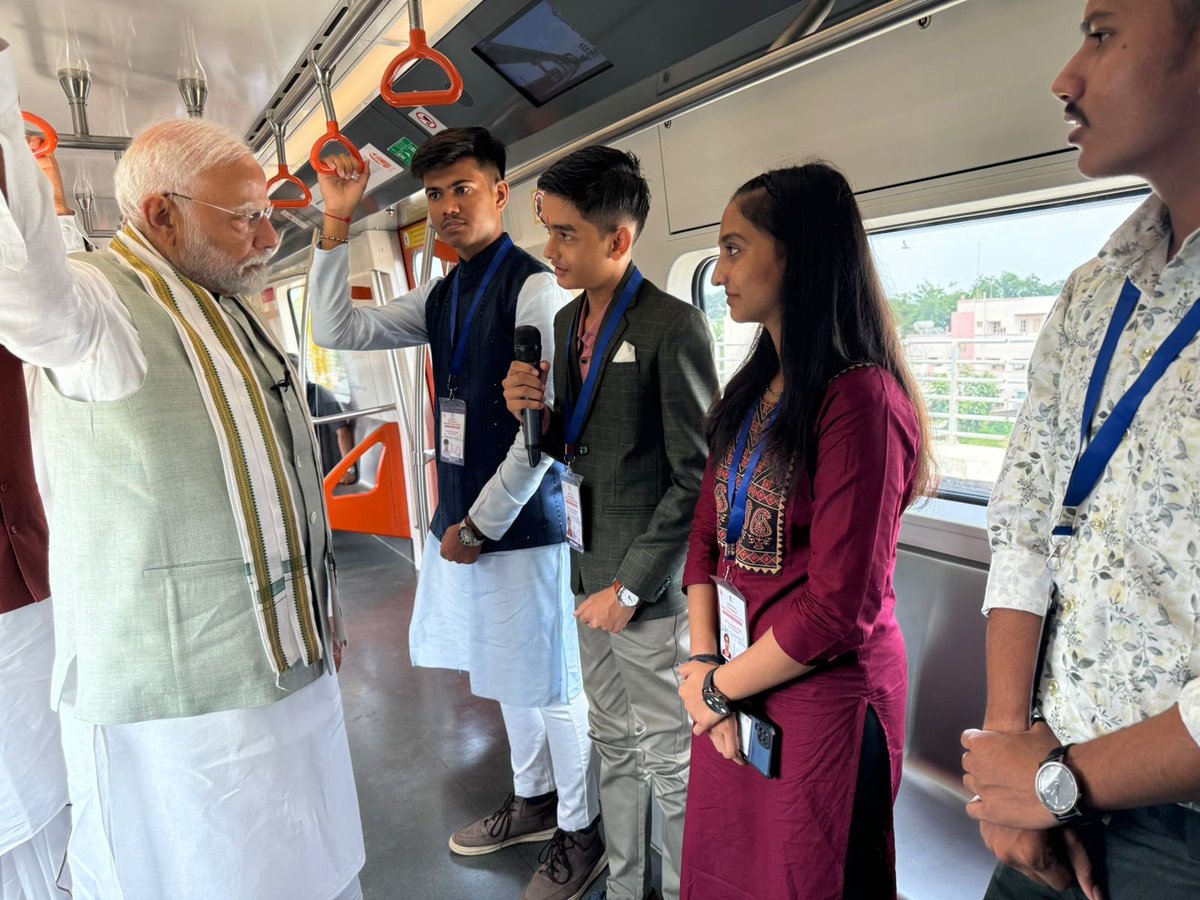 Inaugurated Phase-II of the Ahmedabad Metro Rail Project and on the way to today’s programme with energetic youngsters.