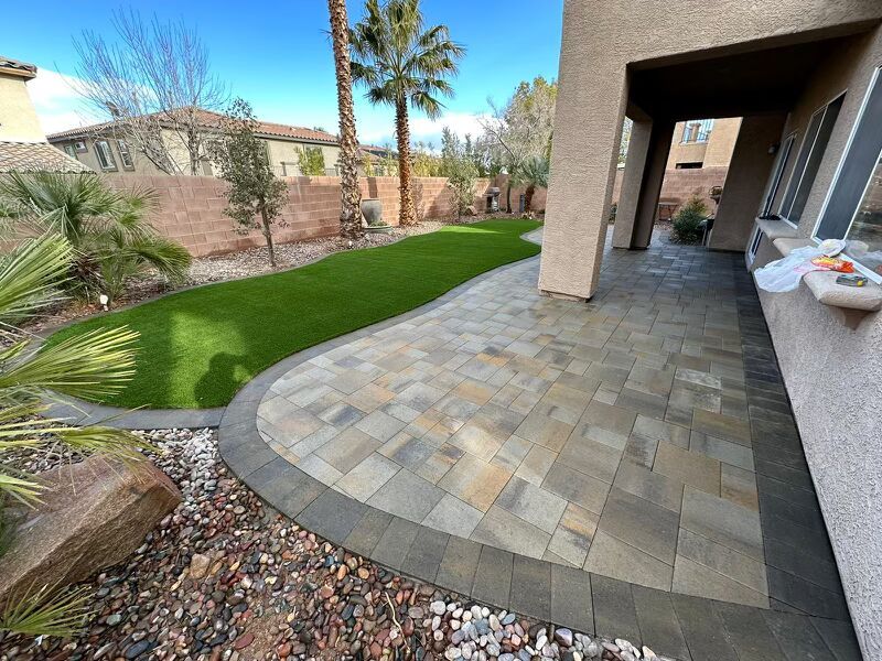GLS_Lasvegas's tweet image. Whether you’re looking for a sleek, modern patio or a low-maintenance green oasis, this yard has it all. Perfect for relaxing or entertaining! 😀 Call us for a FREE quote today! 📲#LandscapingGoals #PaverPerfection #SyntheticGrass #OutdoorLiving