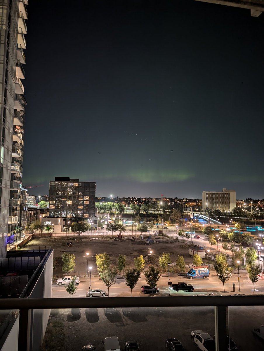 My first ever experience with the northern lights, from my balcony downtown too 🥹