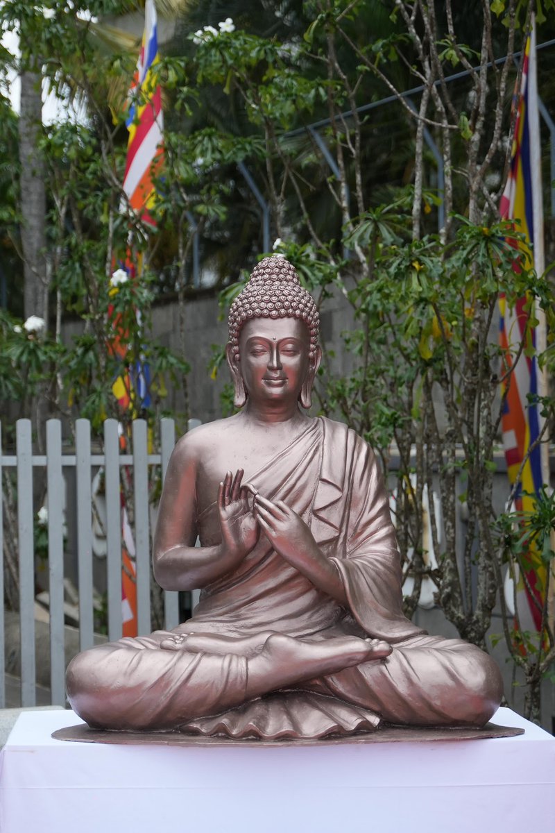 IndiainSL's tweet photo. The 4-feet-tall copper statue, weighing nearly 330 kgs, commissioned by @iccr_hq on the request of Hon. PM @DCRGunawardena. It depicts Lord Buddha in the Dharmachakra Mudra, symbolising setting into motion of the ‘Wheel of Dhamma’. https://t.co/OHMi1EjIgZ