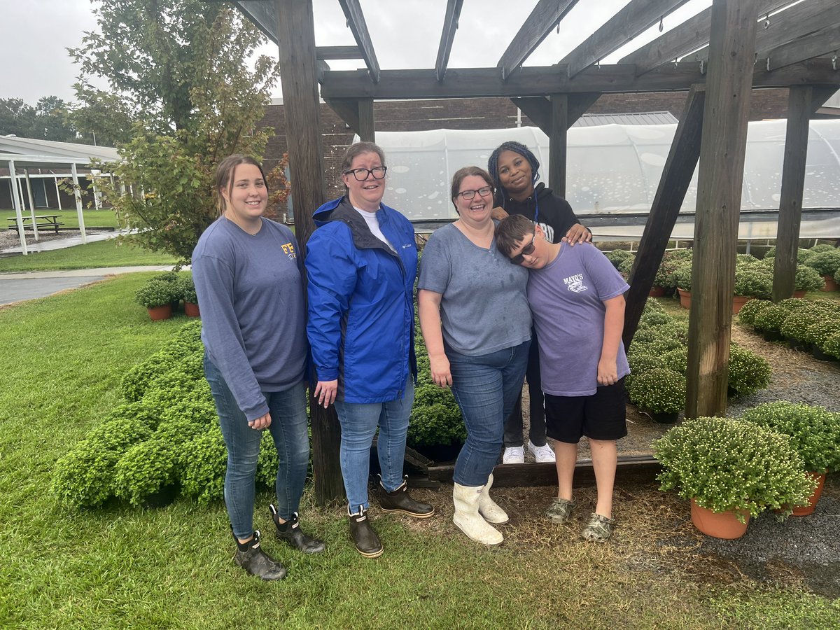 Hyde County Schools FFA students and staff brave the flood waters to unpack the mums for their plant sale. #cte