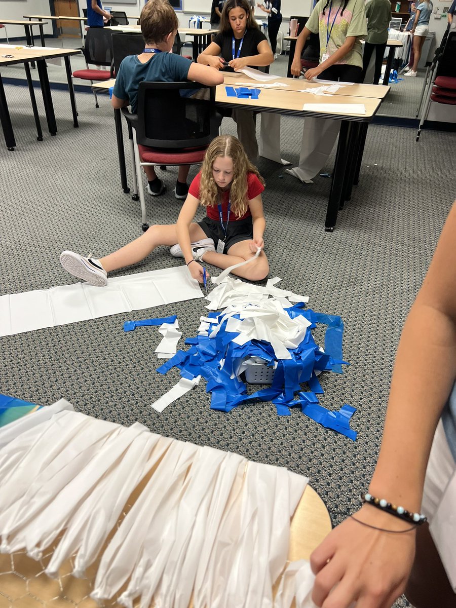 Comanche Crew is making pep rally decorations!