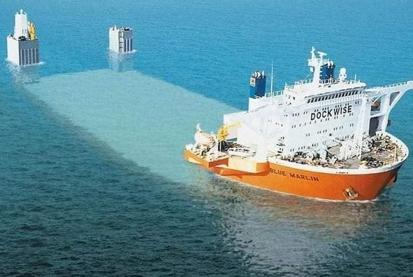 Paco2040's tweet photo. The giant that transports other giants: MV Blue Marlin
 is a one-of-a-kind vessel, designed to transport massive structures such as oil platforms and even warships. Operated by Dockwise Shipping of the Netherlands, The Blue Marlin has been used on high-profile missions, https://t.co/xkXtGG0wf4