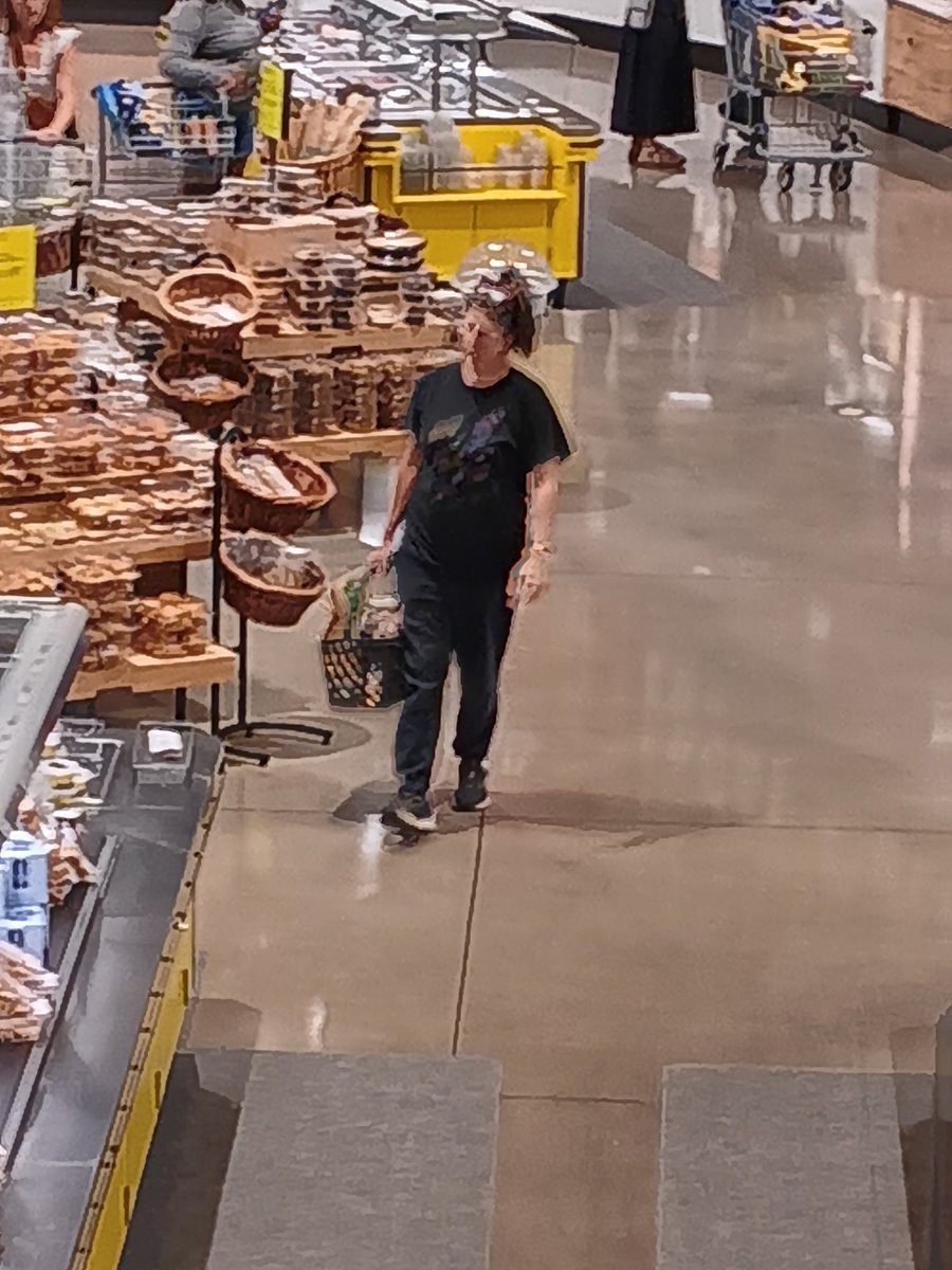 Spying on Eileen at the grocery store. Goal: find out where she hides the snacks.