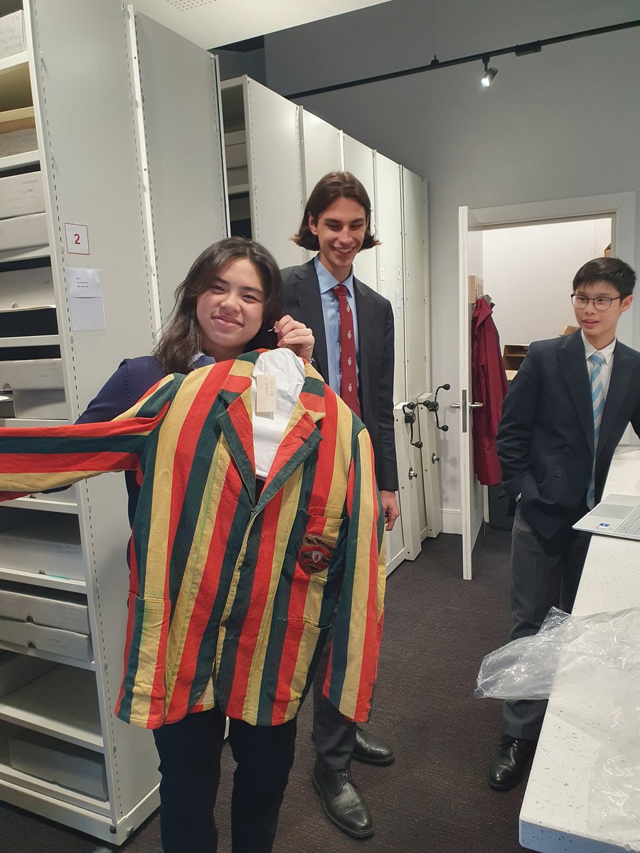 Flamboyant <a href="/OldBromsgrovian/">Old Bromsgrovians</a> Club blazer a hit with #ArchiveClub <a href="/BromsService/">Bromsgrove Service</a> students hanging and listing <a href="/BromsSchool/">Bromsgrove School</a> uniform collection.  This was donated by an OB and we would welcome other donations from former staff and students. #SchoolArchives