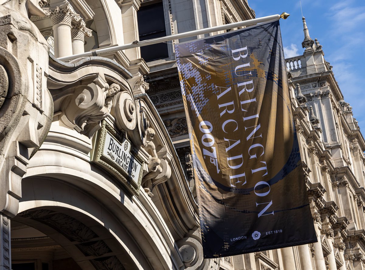 007's tweet photo. In homage to the 1964 classic film GOLDFINGER, the prestigious Burlington Arcade in Mayfair has created a unique 007 experience – The 007.

The 007 features two exclusively designed bars, open from 18 September until 31 December, where fans may enjoy a dash of 007 with signature cocktails.

Each day, there will be a giveaway of a collector’s edition GOLDFINGER Sixty Years poster for the first 25 customers who make a purchase in the boutique.