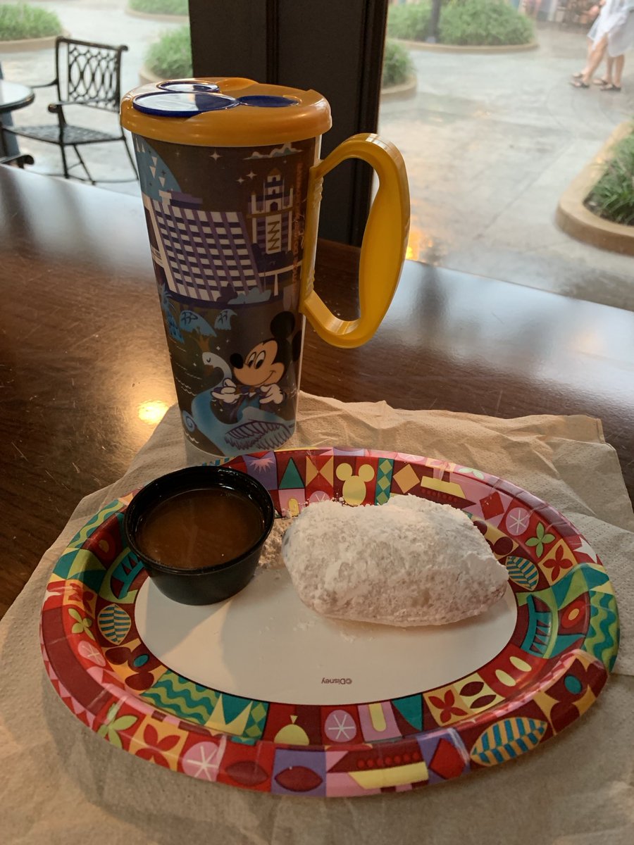 GFRetailHQ's tweet photo. 🟣🟢🟡 WHAT?!! Did someone say it's the first ever National Beignet Day!!! 😋 Here's our #GlutenFree #beignet from Port Orleans French Quarter resort at #DisneyWorld. #NationalBeignetDay https://t.co/If2vpsxazA