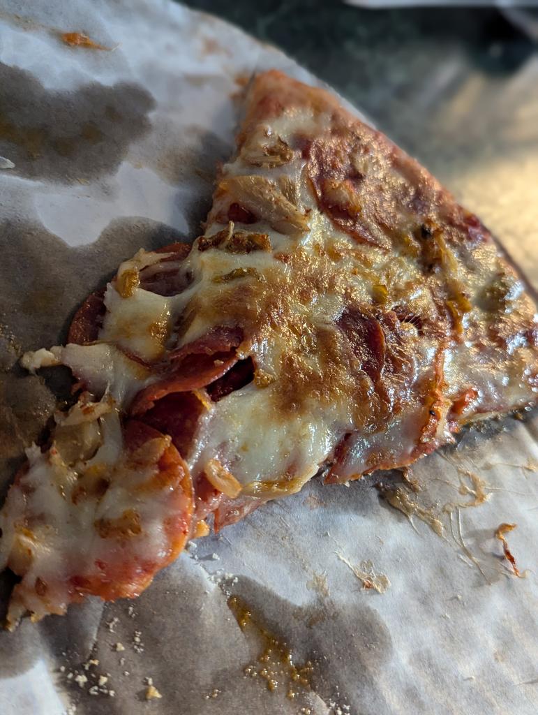 Put some kimchi on a pepperoni take n bake.   Oh my goodness.  Tasty.