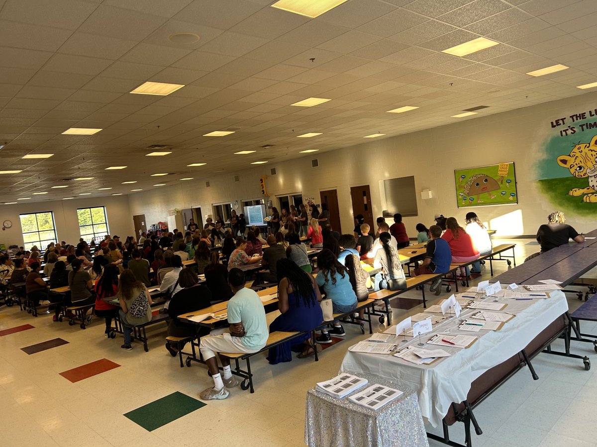 TweetDCS_DCPS's tweet image. We are enjoying meeting with our 2nd grade families at DCP tonight!! 💜💛 #LilJags
