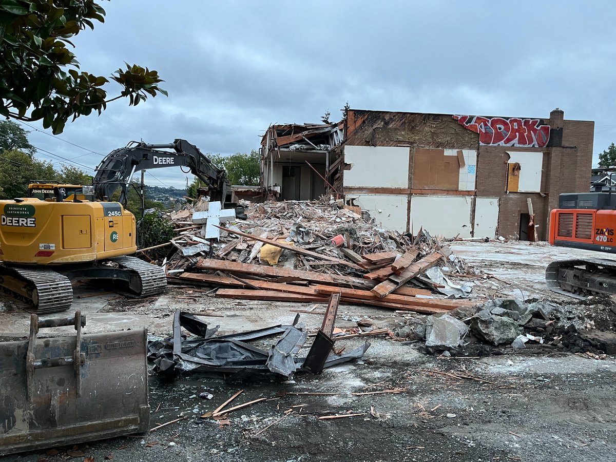 A picture worth 1,000 words. A local Seattle church building being torn to be developed into housing.