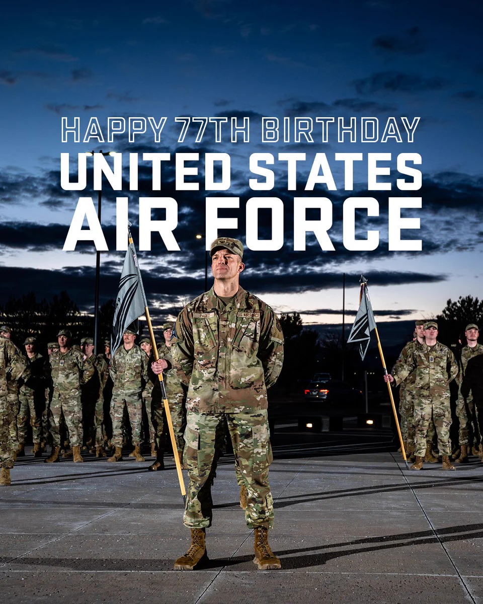 Guardian and Airmen stand holding flags with the words, “Happy 77th Birthday United States Air Force” written across the top.