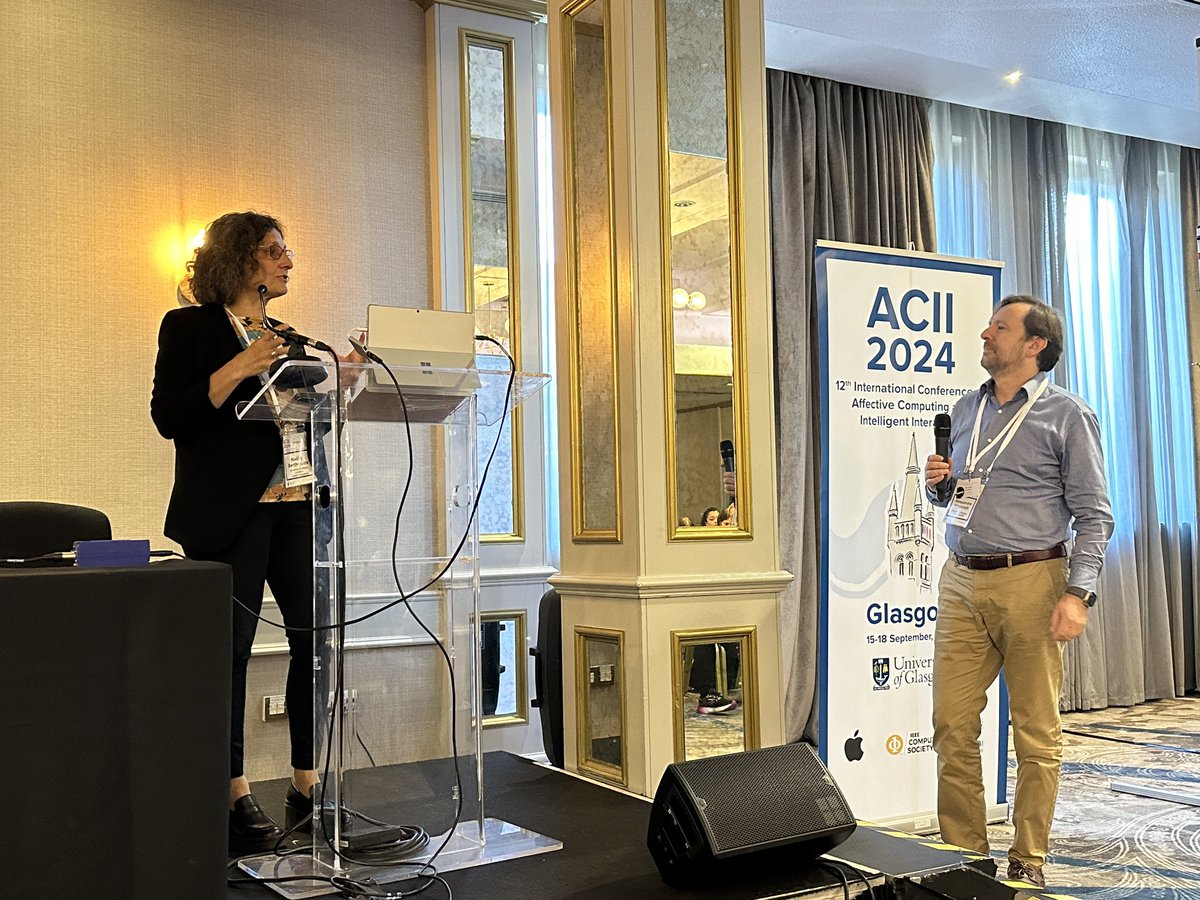 ACII2024 (@acii_conf) on Twitter photo Inspiring keynote by <a href="/nadiaberthouze/">Nadia Berthouze</a> at #ACII2024: ‘Affective Interactive Technology for Wellbeing and Healthcare’ 💡🤖. Her insights into how emotional intelligence in tech can revolutionize healthcare and enhance wellbeing left the audience in awe. #HealthTech Inspiring keynote by <a href="/nadiaberthouze/">Nadia Berthouze</a> at #ACII2024: ‘Affective Interactive Technology for Wellbeing and Healthcare’ 💡🤖. Her insights into how emotional intelligence in tech can revolutionize healthcare and enhance wellbeing left the audience in awe. #HealthTech