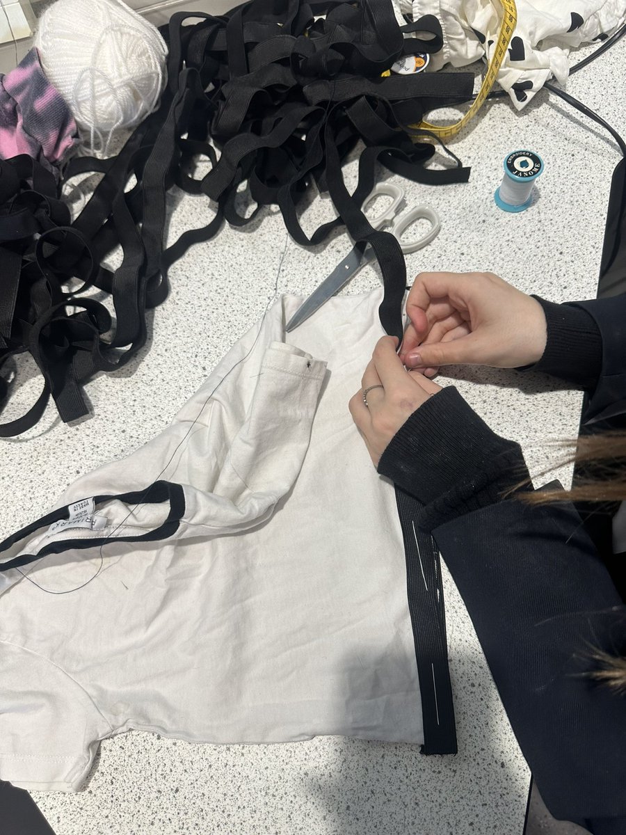 The sustainability committee were working hard at lunchtime on their deigns for our ‘trashion’ show 🪡 🧵 👗