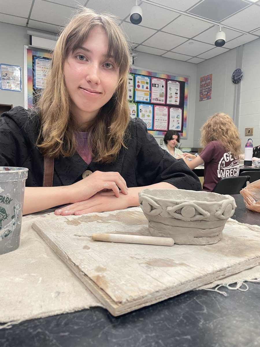 Talented Sophomore Jeanne Hanson working on her coil vessel in Sculpture 2. <a href="/HumbleISD_KPHS/">Kingwood Park HS</a>