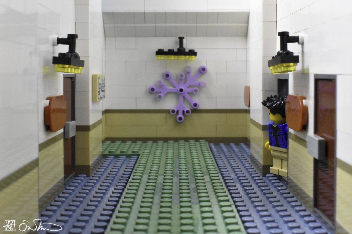 legogradstudent's tweet image. Peeking outside his conference hotel room, the grad student evades awkward encounters with other attendees.