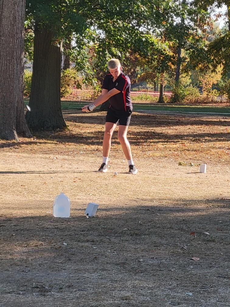 Lion golf team competing in the SBAAC Tr.