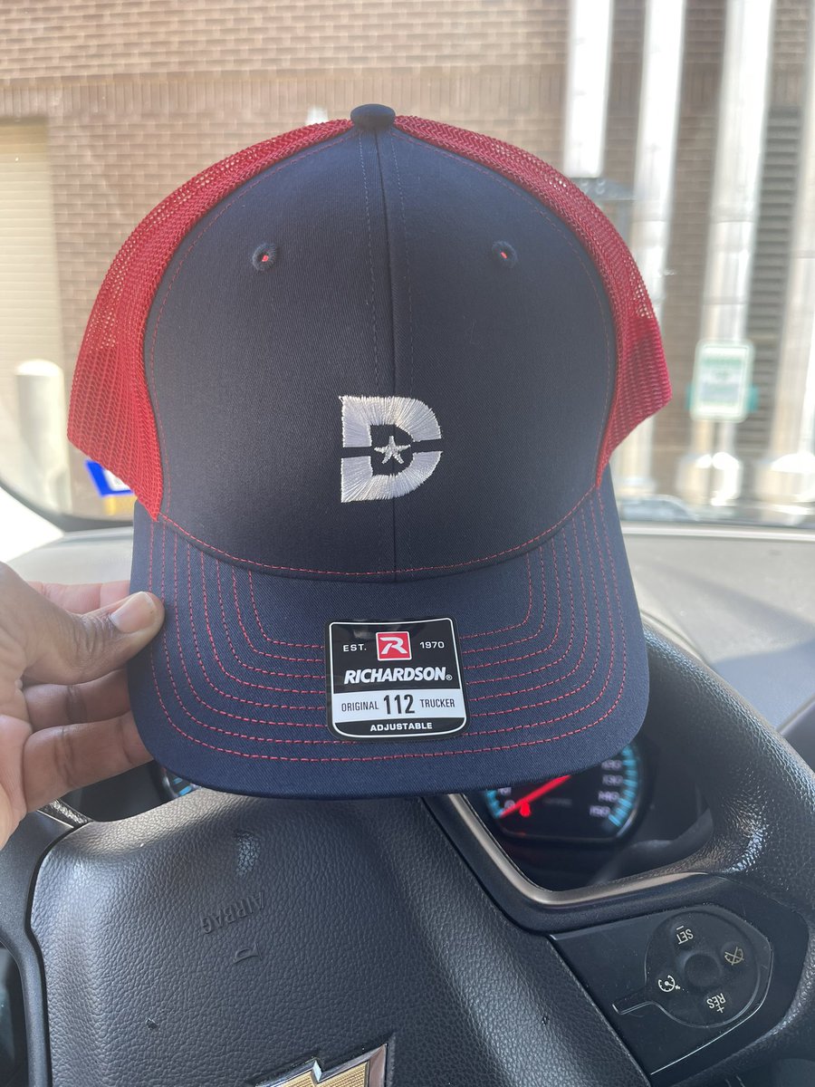 As you all know, I love baseball caps! A few weeks ago at Dallas College North Lake Campus, I saw John Ochoa sporting a red and blue Dallas College trucker cap, and I couldn't resist asking him where he got it. He directed me to the amazing Pam Laney.