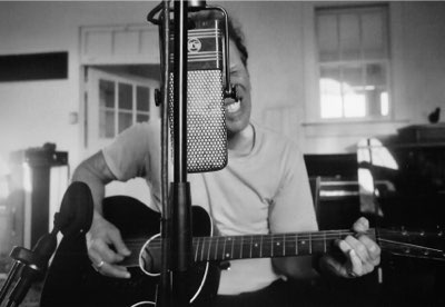 Celebrating 20 Years of Real Gone: "an electric pill box, a homogenous concoction of mood elevators, mind liberators, and downers, an alchemical universe of rattling chains, oscillating rhythms and nine-pound hammers.” – Tom Waits, 2004