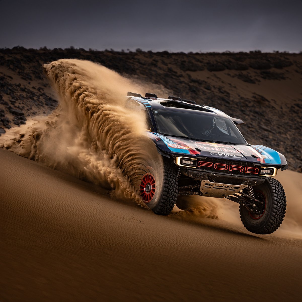 FordRacing's tweet photo. It's time to dance with the desert. @CSainz_oficial and @mattiasekstroem are set to take on @MarocRallye behind the wheel of the @Ford Raptor T1+ — the final frontier before our biggest challenge yet: the @dakar. https://t.co/72KFPJOznF