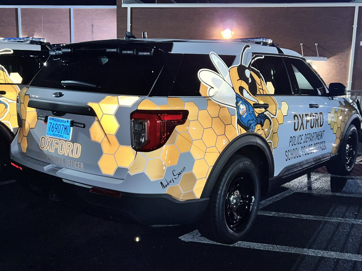 Today, the Oxford Police Department unveiled our new School Police Officer vehicles, featuring a graphic design created by Oxford High School Senior, Audrey Saxon. Her design stood out among her peers and was selected as the best. To honor her contribution, we proudly displayed