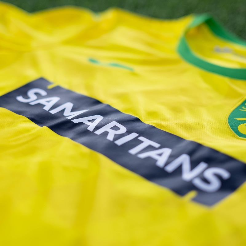 NorwichCityFC's tweet photo. The logo of @samaritans will once again feature on our men's and women's shirts this weekend. 

Thank you to our partners @BlakelyClothing, @SekuraID, @GCTourism and @BlueHeron50 for supporting our mission to prevent suicide and boost mental health.