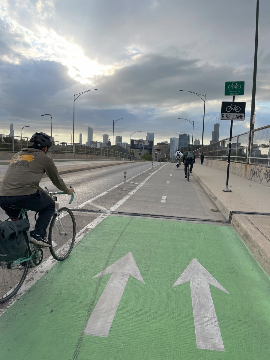 _atalliance's tweet photo. "What a great day for a bike commute! On day 2 of #WeekWithoutDriving, I am thankful for protected bike lanes and bike buddies. We need more of both!" – Miriam, ATA Comms Associate #WeekWithoutDrivingChicago https://t.co/5HGpT0vwGb
