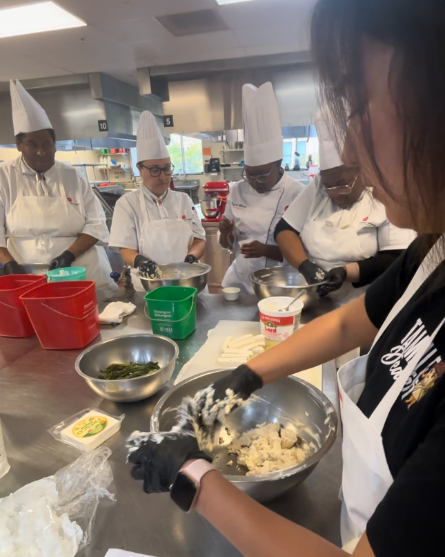 CIMtweet's tweet photo. Chef Marisela shared her family’s tamale recipe with CIM students, teaching them the art of authentic cooking! Along with hands-on experience, she opened up about the challenges of running a family business. A true lesson in passion and perseverance. 🌽👩‍🍳 #CulinaryTradition https://t.co/SG23I7KVe8