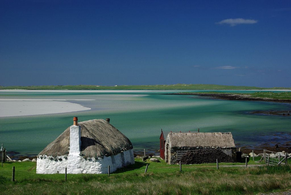 Thatch cottage by the sea. On North Uist, Outer Hebrides, Scotland. NMP.