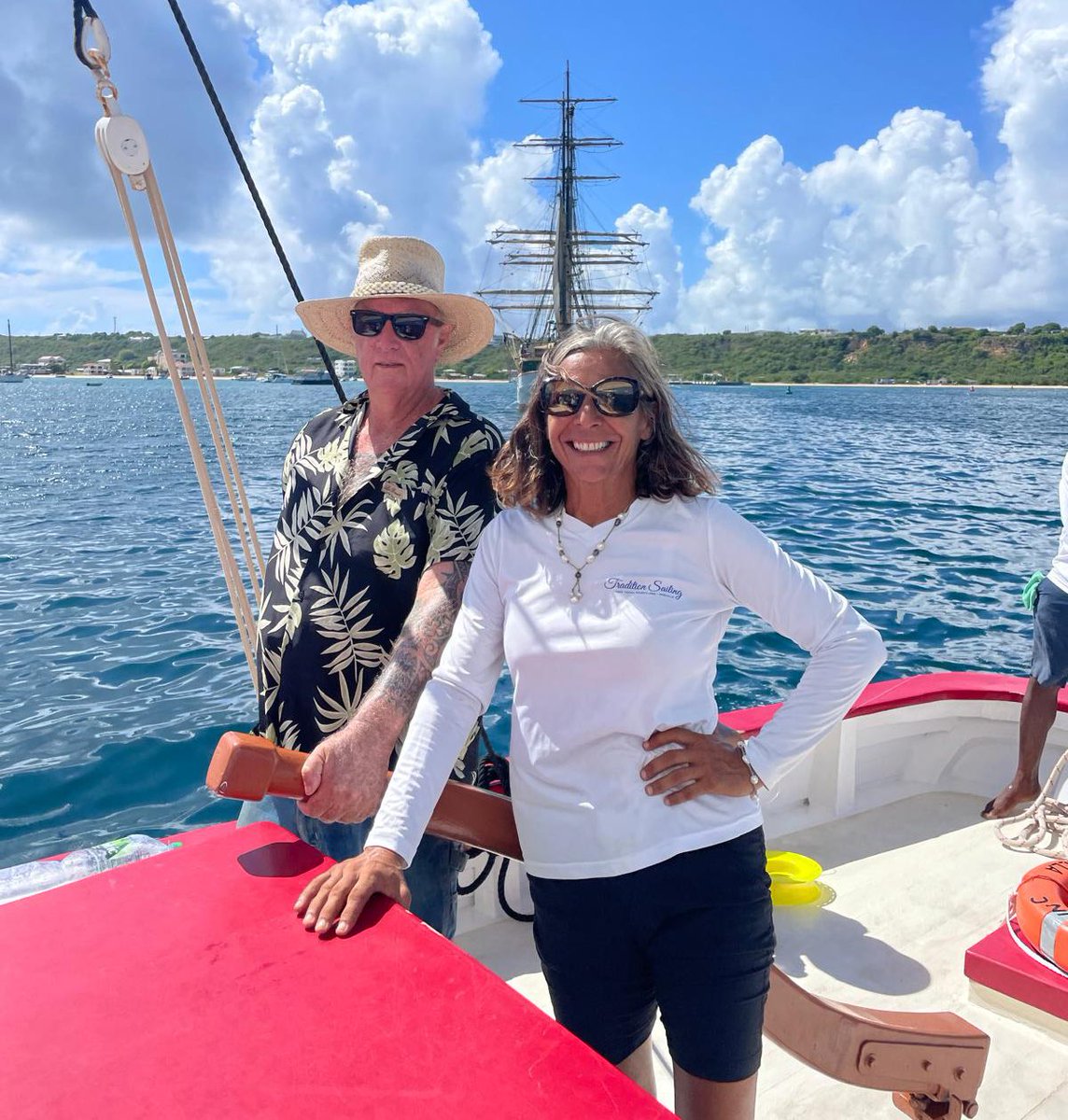 Remember Deb’s former sailing vessel Picton Castle? That’s a picture of it behind her when it last visited #Anguilla. <a href="/picton_castle/">Picton Castle</a>’s next world voyage is coming up! See the interview with Captain Dan: youtu.be/3baeg46cmnE?si…

#TraditionSailingAnguilla