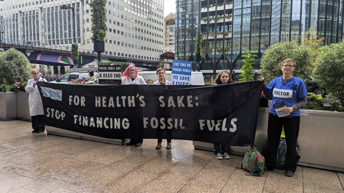 Members of London Health and Science for XR outside JP Morgan's offices. <a href="/jpmorgan/">J.P. Morgan</a>  have poured over £200Billion into new fossil fuel development since global leaders committed to keeping global heating well below 2 degrees. Something doesn't add up.